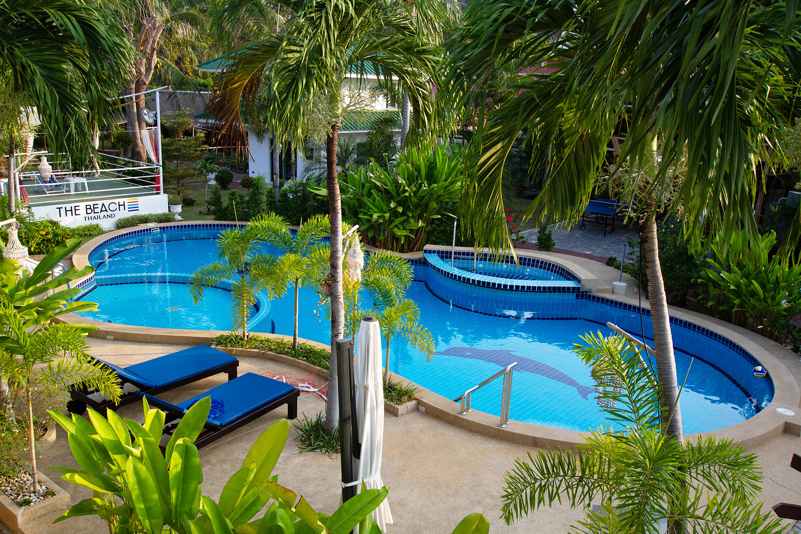 "Outdoor pool at an addiction treatment center in Thailand, offering a serene environment for recovery."